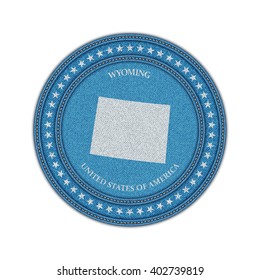 Label with map of wyoming. Denim style. Vector eps 10