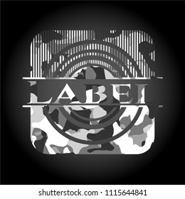                               Label on grey camouflaged pattern                                           