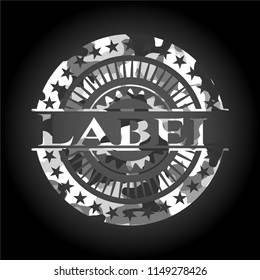 Label on grey camouflaged texture