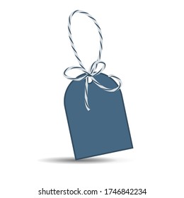 Label with ribbon on a white background. Empty life label, price tag with twine. Stock Photo.
