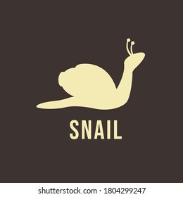 Label in the shape of a snail of light color on a brown background with the text "Snail".