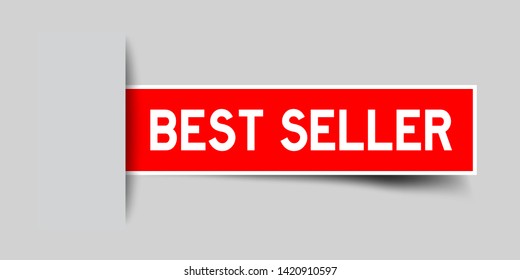 Label sticker red color in word best seller that inserted in gray background