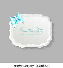 label in vintage style. save the date sticker isolated on gray. blue bow. wedding rings