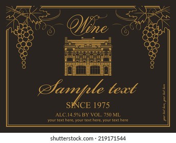 label for wine with an old house and a bunch of grapes