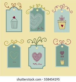 Labels with hand-drawn hearts. Doodle technique.