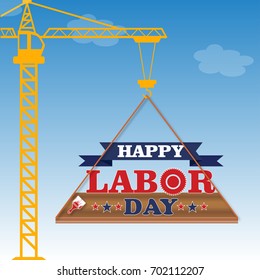 labor day american flag construction crane lifting up the typography of Happy Labor Day