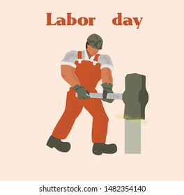 labor man works with a hammer 