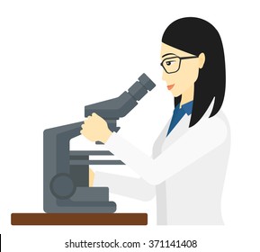 Laboratory assistant with microscope.