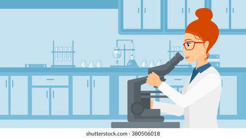 Laboratory assistant with microscope.