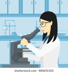 Laboratory assistant with microscope.