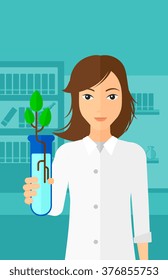 Laboratory assistant with test tube.