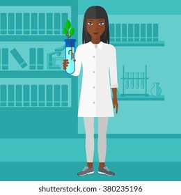 Laboratory assistant with test tube.
