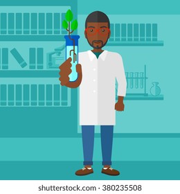 Laboratory assistant with test tube.