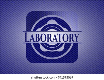 Laboratory emblem with jean background