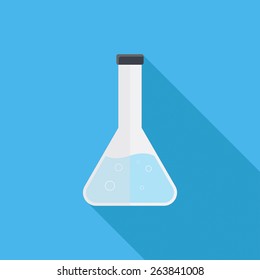laboratory glass with long shadow