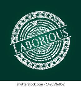 Laborious chalk emblem written on a blackboard. Vector Illustration. Detailed.