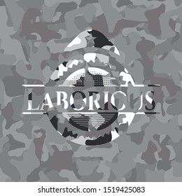 Laborious on grey camouflage texture