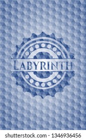 Labyrinth blue emblem or badge with geometric pattern background.
