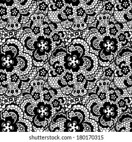 Lace black seamless pattern with flowers on white background