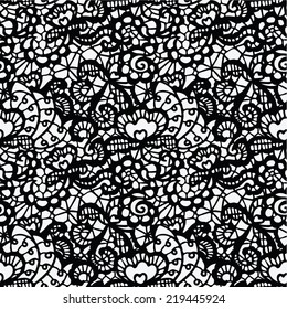 Lace black seamless pattern with flowers on white background