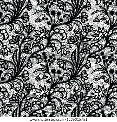 Lace black seamless pattern with flowers on white background