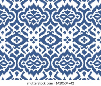 Lace border. Ikat seamless pattern. Vector tie dye shibori print with stripes and chevron. 