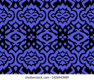 Lace border. Ikat seamless pattern. Vector tie dye shibori print with stripes and chevron. 