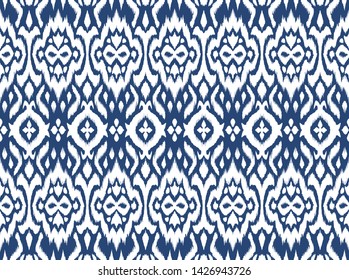 Lace border. Ikat seamless pattern. Vector tie dye shibori print with stripes and chevron. 