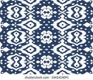 Lace border. Ikat seamless pattern. Vector tie dye shibori print with stripes and chevron. Ink textured japanese background. Ethnic fabric. Bohemian fashion. African creative. Damask rug. 