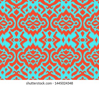 Lace border. Ikat seamless pattern. Vector tie dye shibori print with stripes and chevron. 