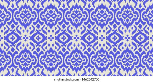 Lace border. Ikat seamless pattern. Vector tie dye shibori print with stripes and chevron. 