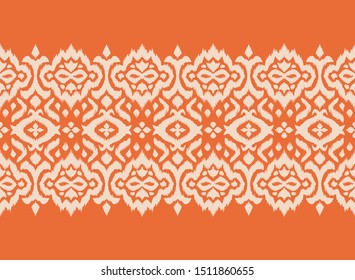 Lace border. Ikat seamless pattern. Vector tie dye shibori print with stripes and chevron. 