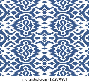 Lace border. Ikat seamless pattern. Vector tie dye shibori print with stripes and chevron. 