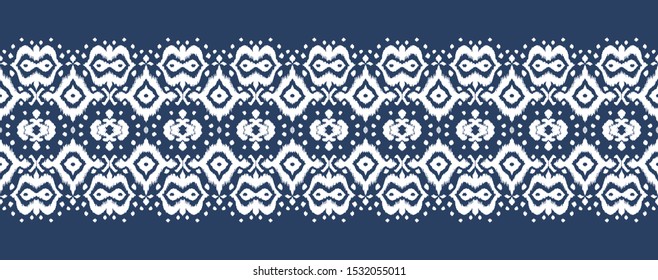 Lace border. Ikat seamless pattern. Vector tie dye shibori print with stripes and chevron. Ink textured japanese background. Ethnic fabric. Bohemian fashion. African creative. Damask rug. 