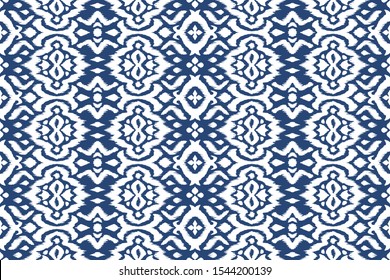 Lace border. Ikat seamless pattern. Vector tie dye shibori print with stripes and chevron. 
