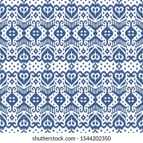 Lace border. Ikat seamless pattern. Vector tie dye shibori print with stripes and chevron. Ink textured japanese background. Ethnic fabric. Bohemian fashion. African creative. Damask rug.