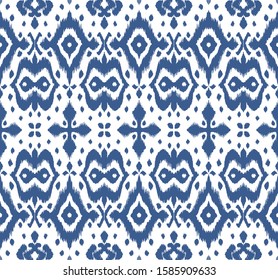 Lace border. Ikat seamless pattern. Vector tie dye shibori print with stripes and chevron. Ink textured japanese background. Ethnic fabric. Bohemian fashion. African creative. Damask rug. 