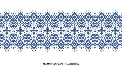 Lace border. Ikat seamless pattern. Vector tie dye shibori print with stripes and chevron. Ink textured japanese background. Ethnic fabric. Bohemian fashion. African creative. Damask rug. 