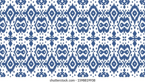 Lace border. Ikat seamless pattern. Vector tie dye shibori print with stripes and chevron. Ink textured japanese background. Ethnic fabric. Bohemian fashion. African creative. Damask rug. 