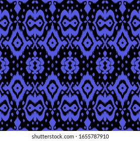 Lace border. Ikat seamless pattern. Vector tie dye shibori print with stripes and chevron. Ink textured japanese background. Ethnic fabric. Bohemian fashion. African creative. Damask rug. 