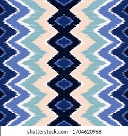 Lace border. Ikat seamless pattern. Vector tie dye shibori print with stripes and chevron. Ink textured japanese background. Ethnic fabric. Bohemian fashion. African creative. Damask rug. 