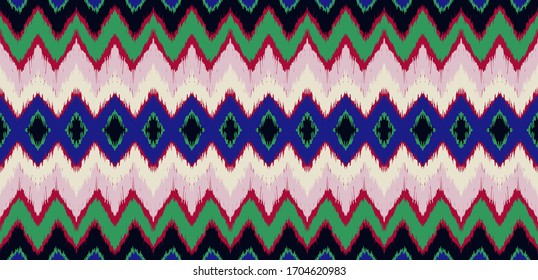 Lace border. Ikat seamless pattern. Vector tie dye shibori print with stripes and chevron. Ink textured japanese background. Ethnic fabric. Bohemian fashion. African creative. Damask rug. 