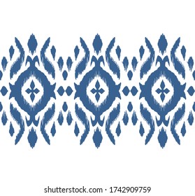 Lace border. Ikat seamless pattern. Vector tie dye shibori print with stripes and chevron. Ink textured japanese background. Ethnic fabric. Bohemian fashion. African creative. Damask rug.