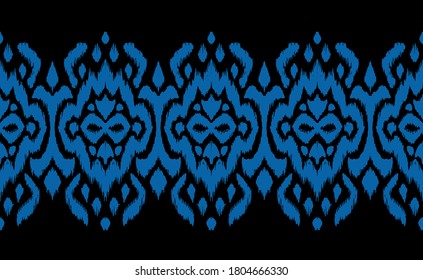 Lace border. Ikat seamless pattern. Vector tie dye shibori print with stripes and chevron. Ink textured japanese background. Ethnic fabric. Bohemian fashion. African creative. Damask rug.