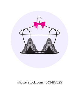 Lace bralette on hanger. Vector illustration. 