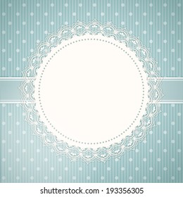 Lace doily border on a blue textured polka dot background