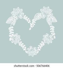 Lace heart. Gentle background with lace pattern in the shape of a heart.