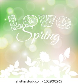 lace lettering on blurred background.