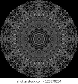 Lace ornamental circle on black background