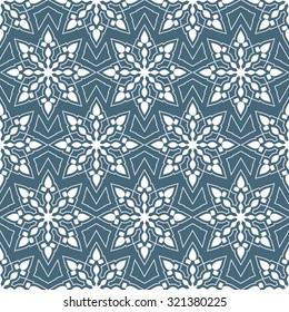 Lace pattern; vector seamless tracery of delicate snowflakes.
Christmas; New Year; Winter.